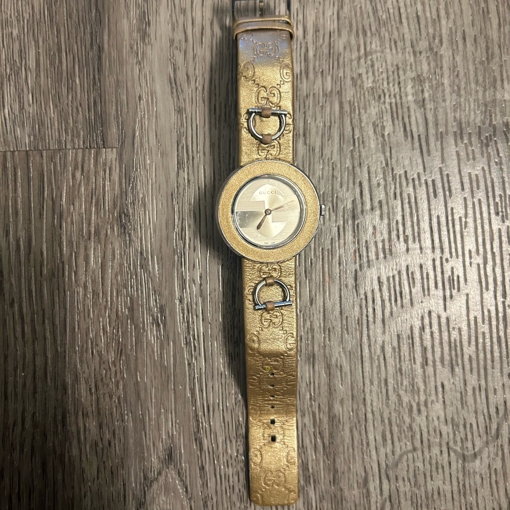 Gucci Gold Leather Bracelet Watch with Embossed GG Strap